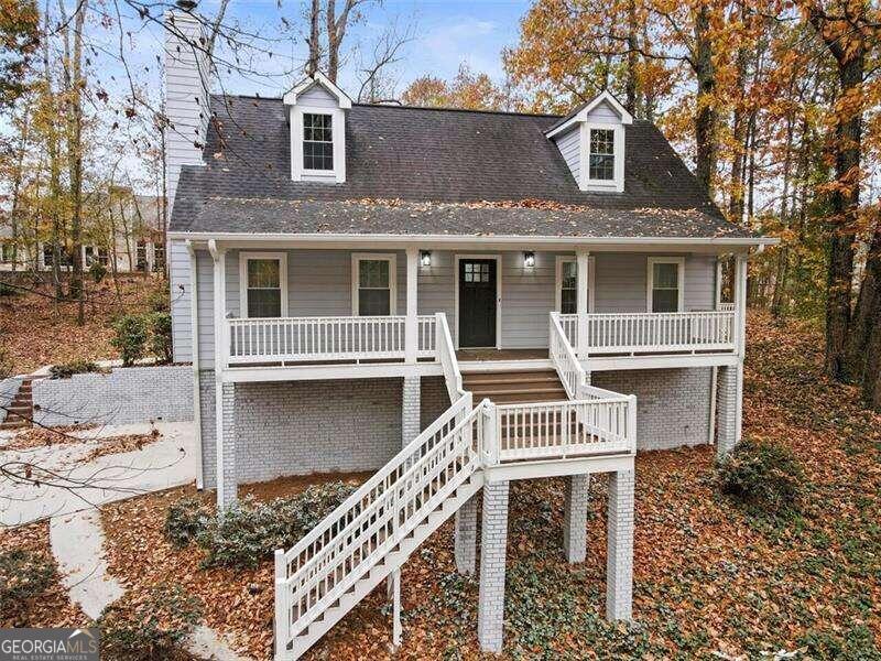 front view of a house with a small yard