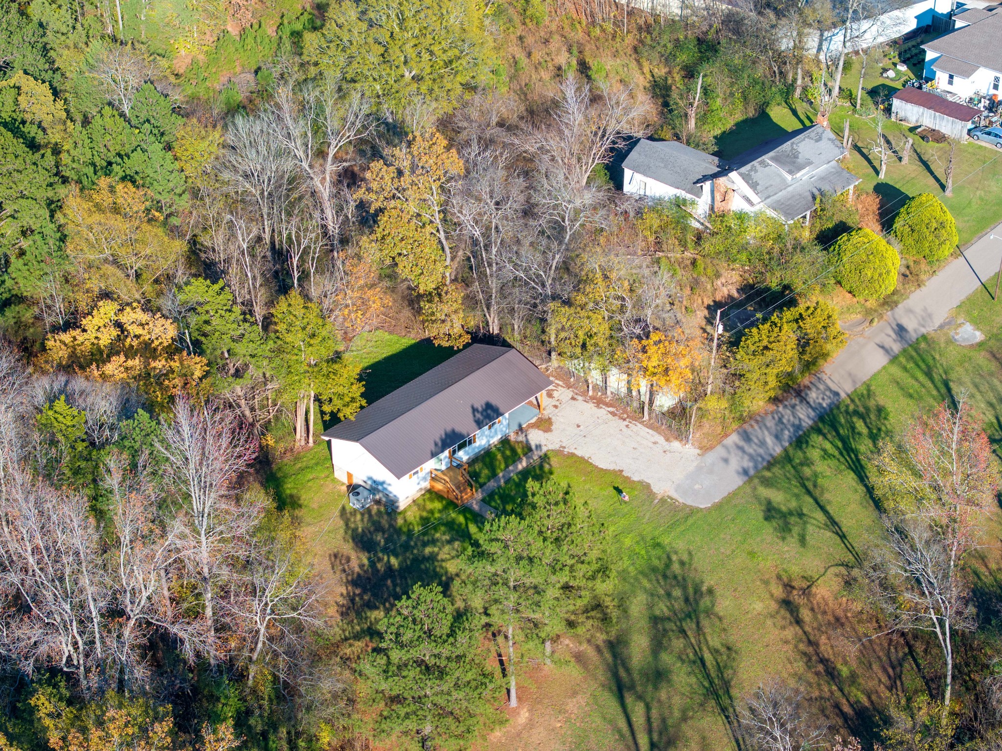 Nestled within the small TN River Town of Decaturville on a dead end street! Privately situated!