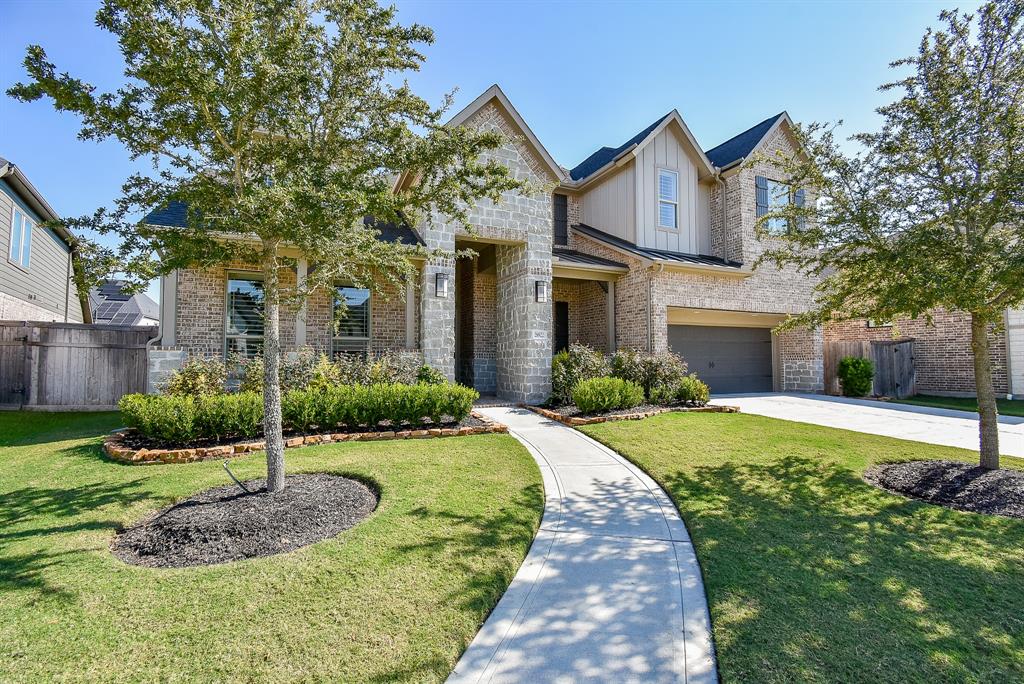 A classic brick and stone facade welcomes you home.