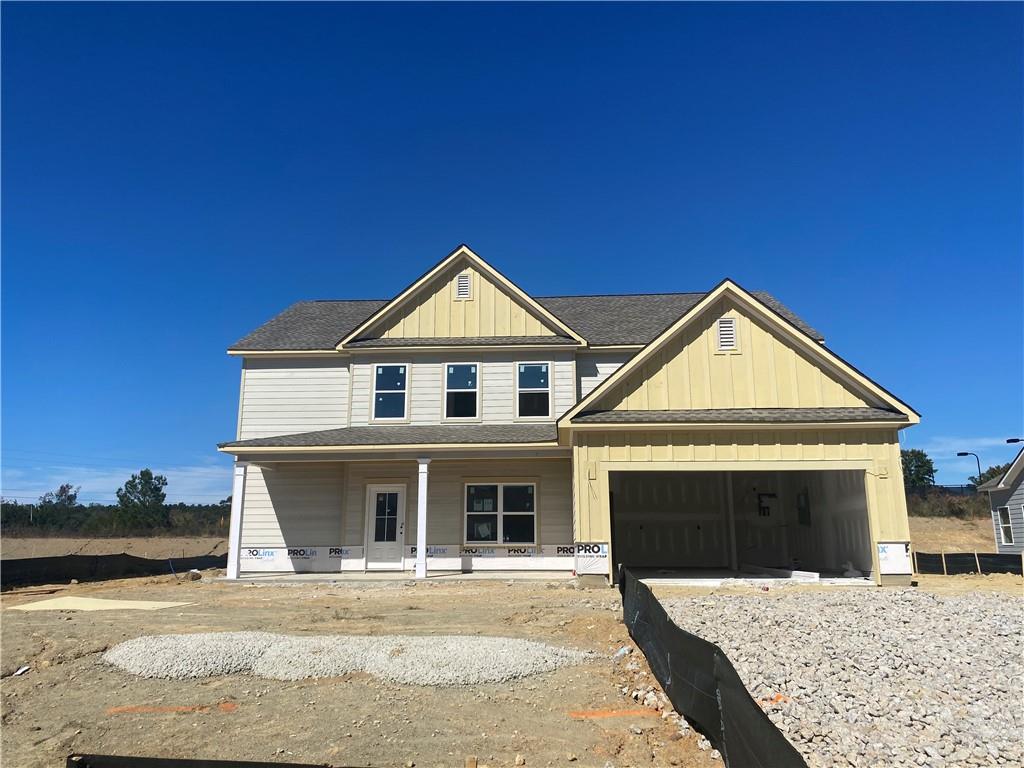 a front view of a house with yard