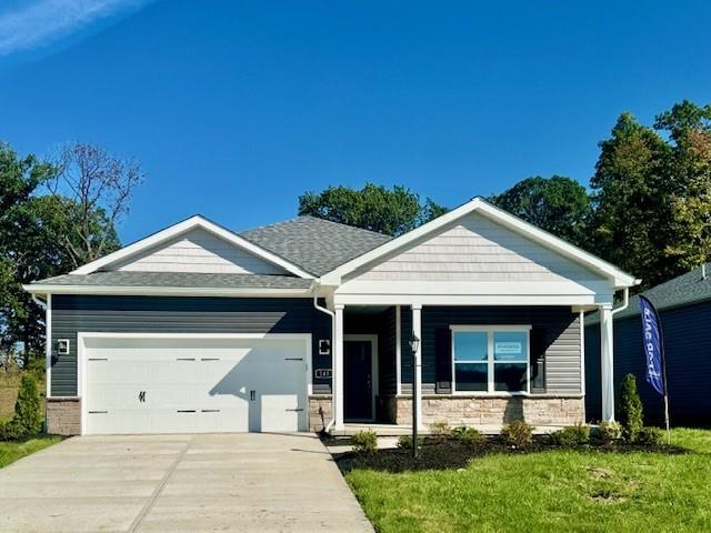 front view of a house with a yard