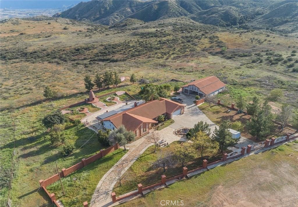 a aerial view of residential houses with outdoor space