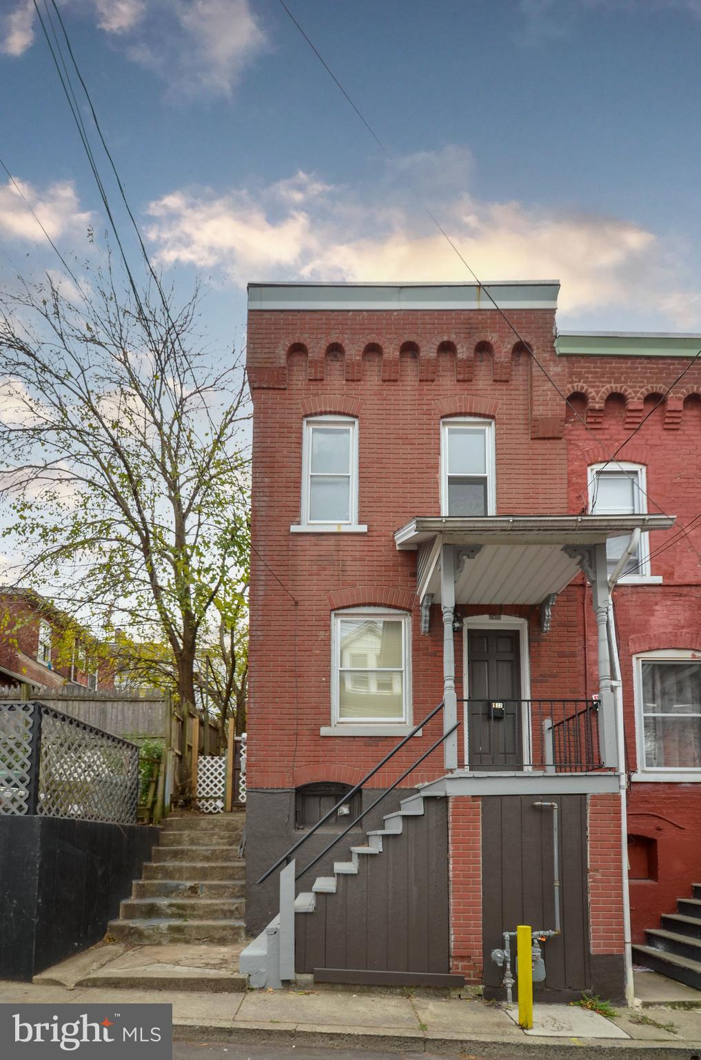 a front view of a building with street