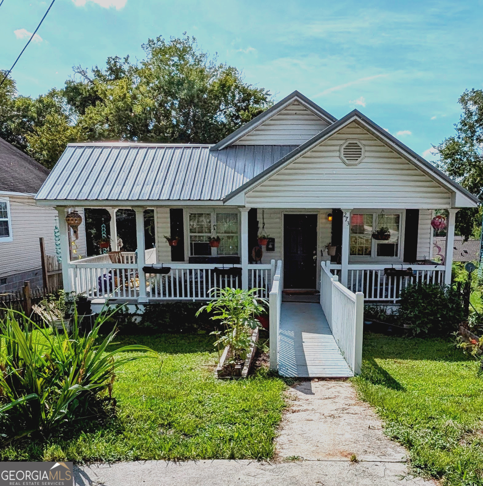 front view of a house with a small yard