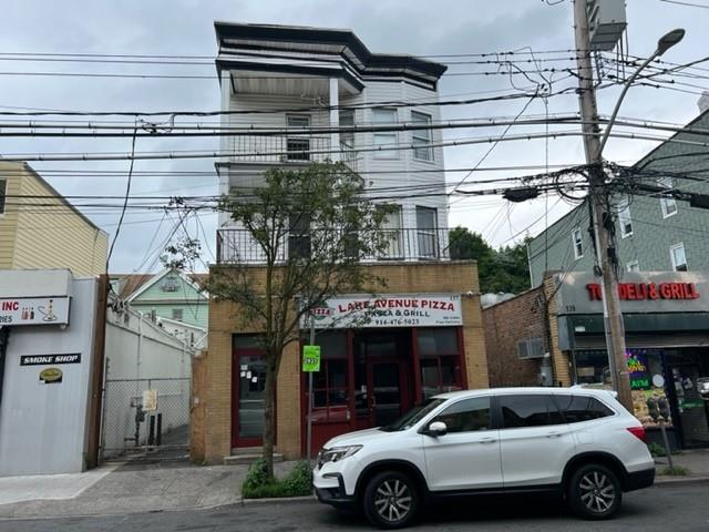 a car parked in front of a building