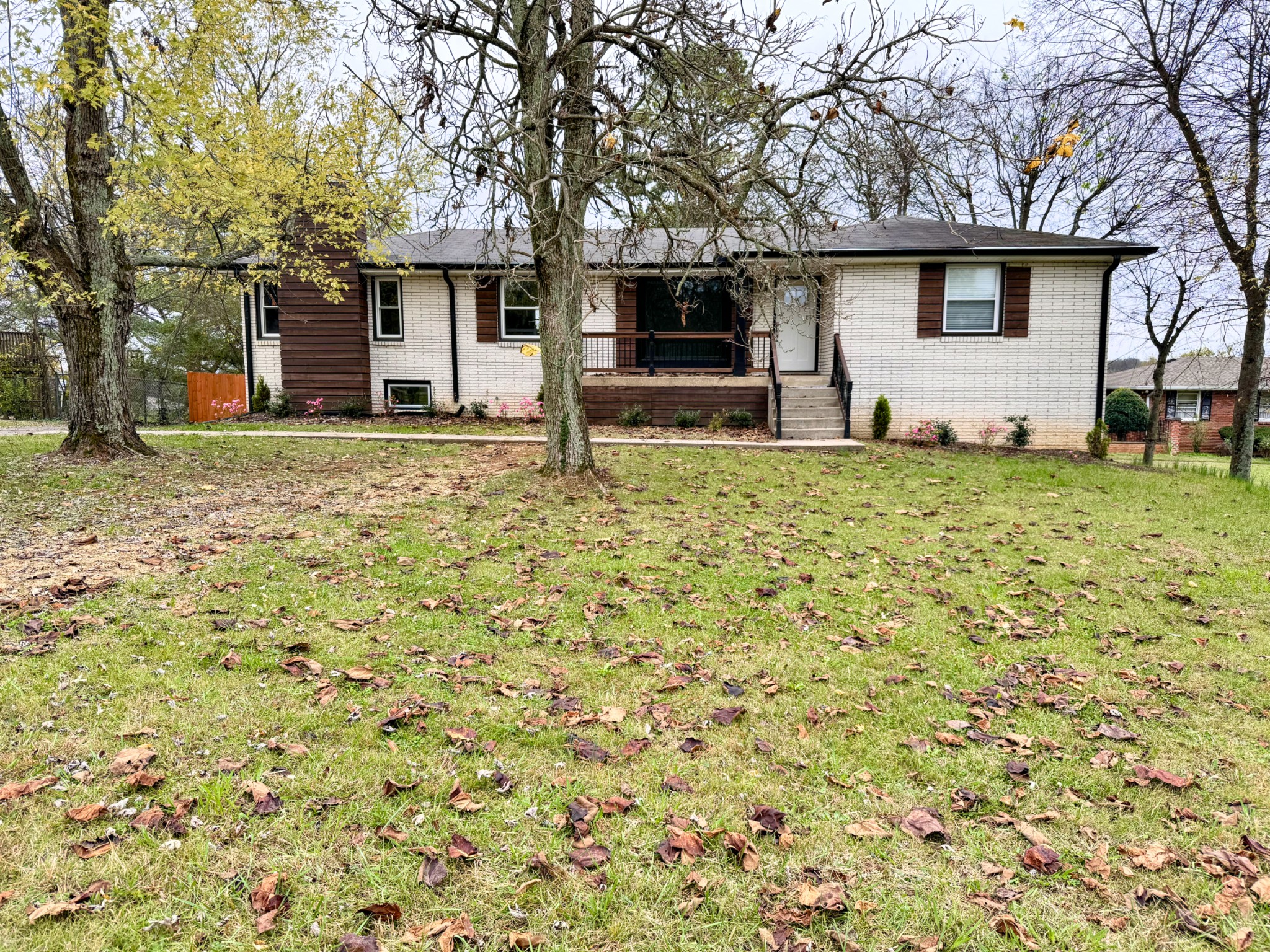 front view of a house with a yard