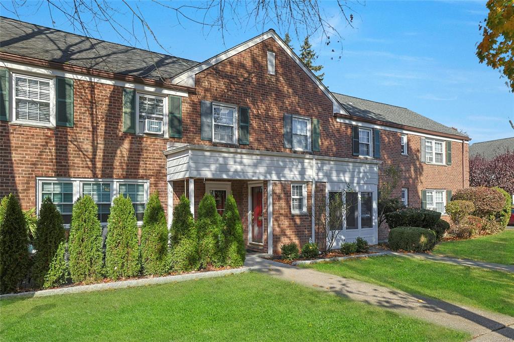 View of front of garden style apartment