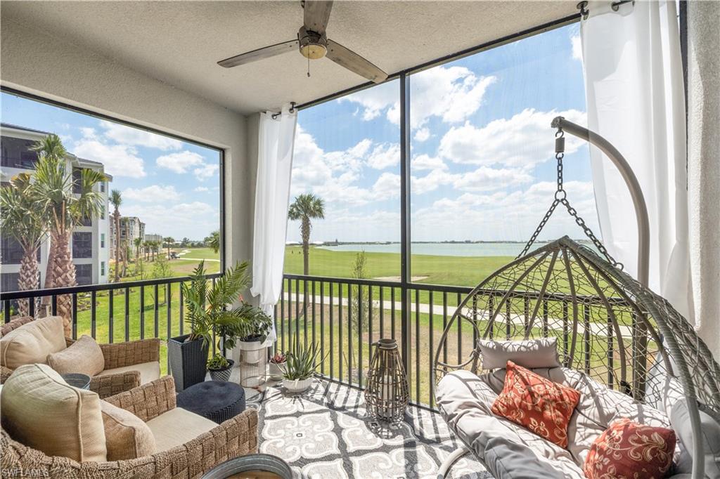 a view of a balcony with furniture