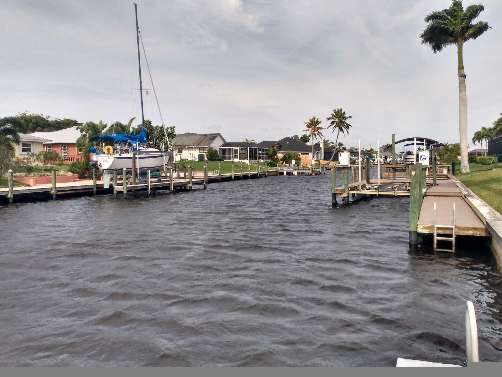 a group of boats are docked in a harbor