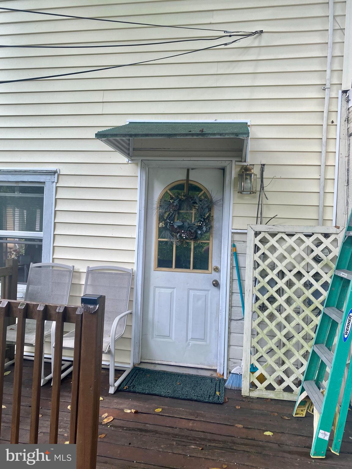 a view of front door and porch