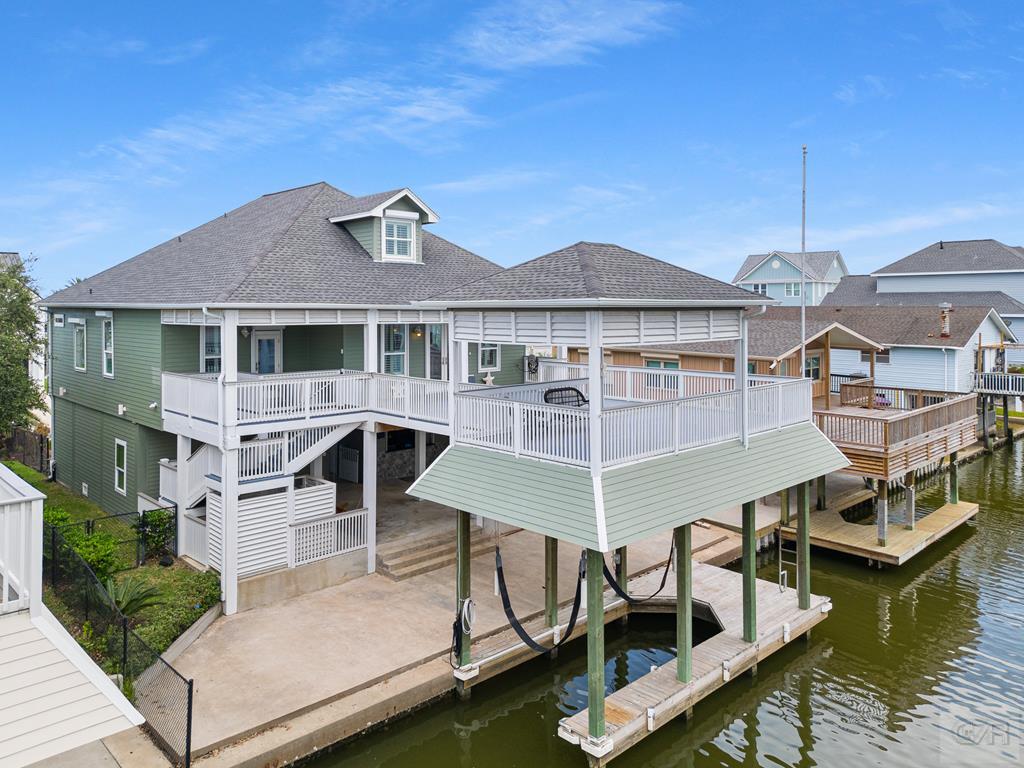 a front view of a house with a boat