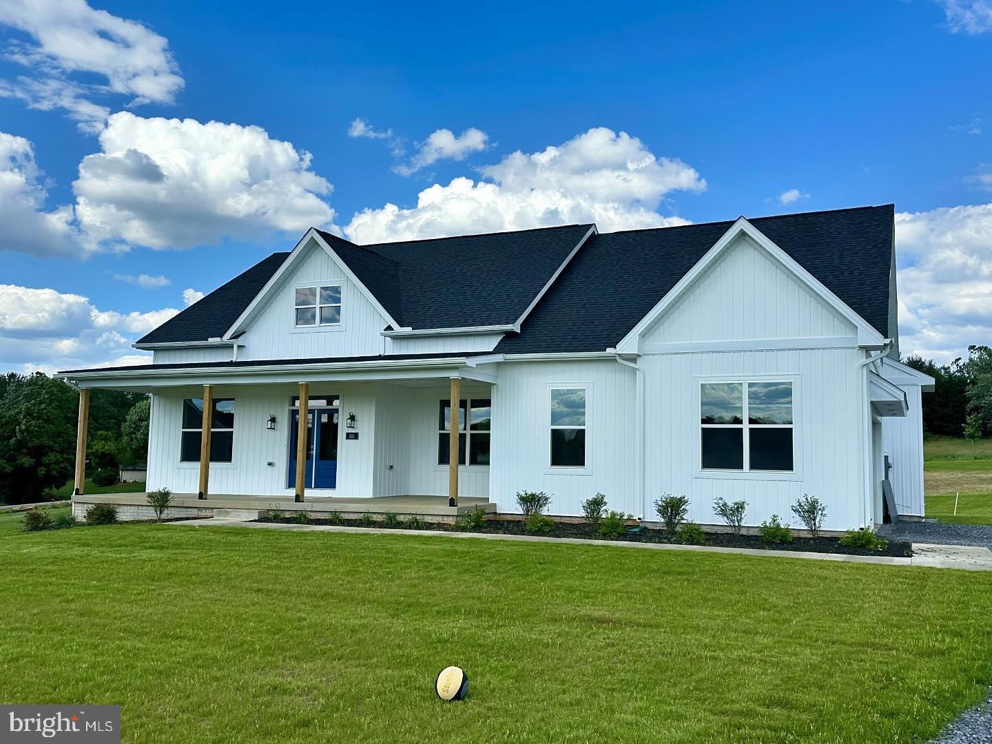 a front view of house with yard