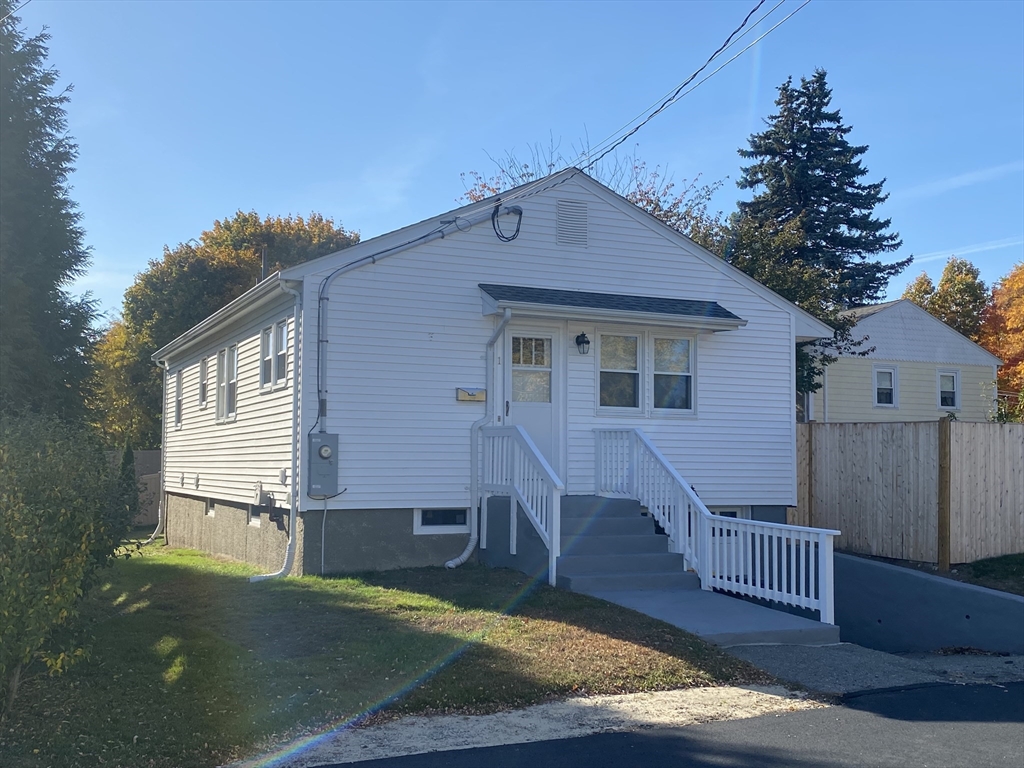 a front view of house with yard