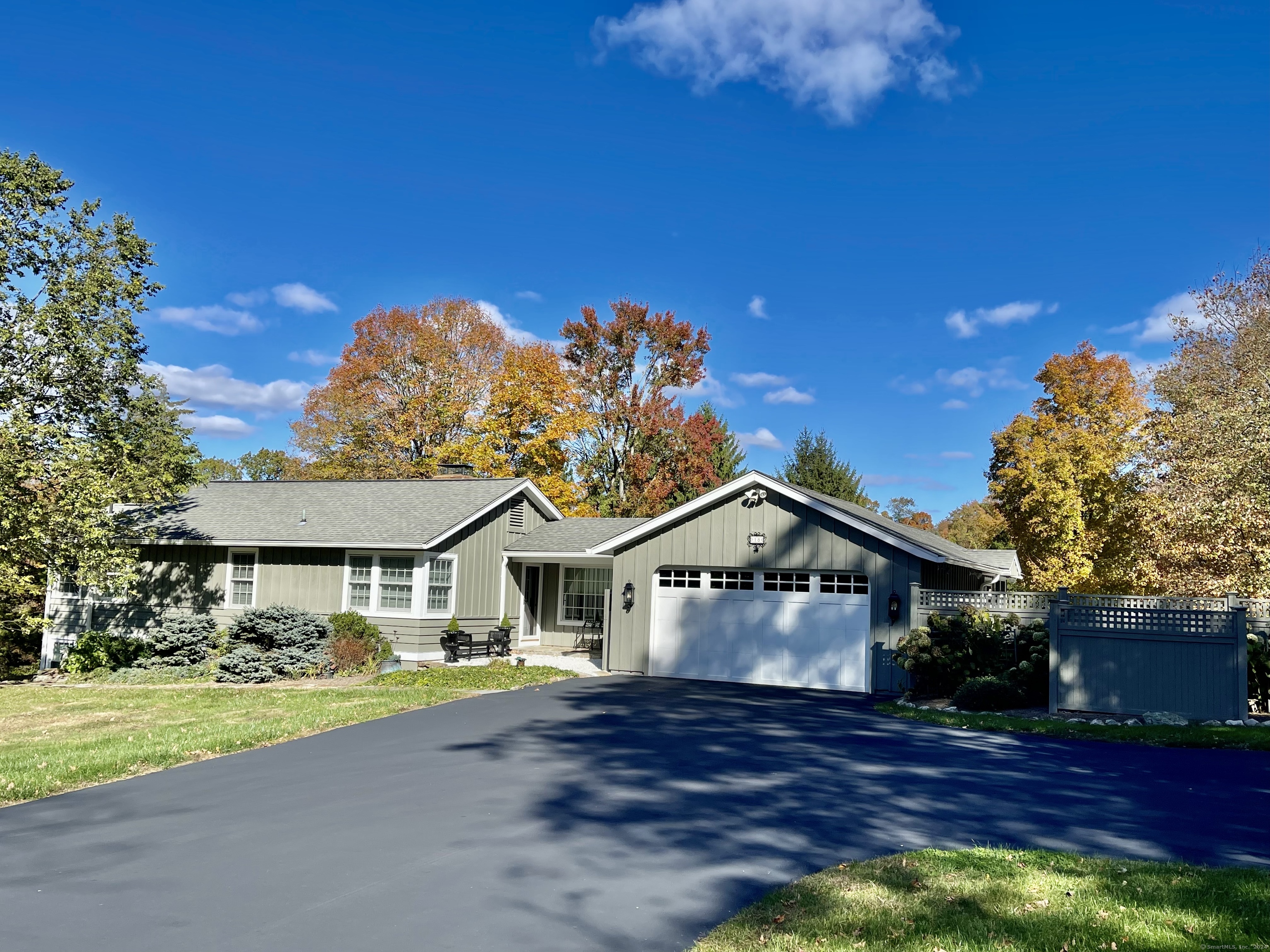 Custom Ranch tucked back on a quiet country road on 3.59 pastoral acres