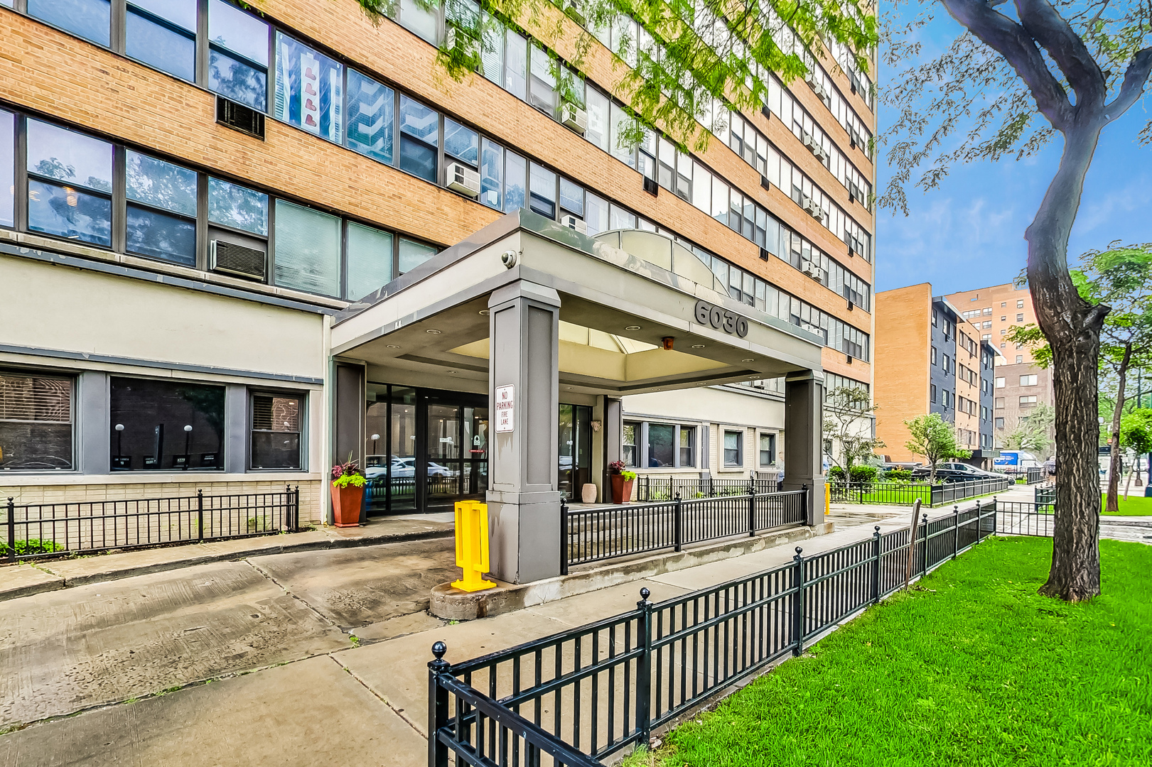 a view of a building with a porch