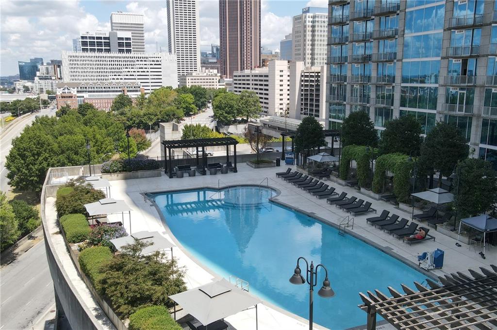 a view of swimming pool from a balcony