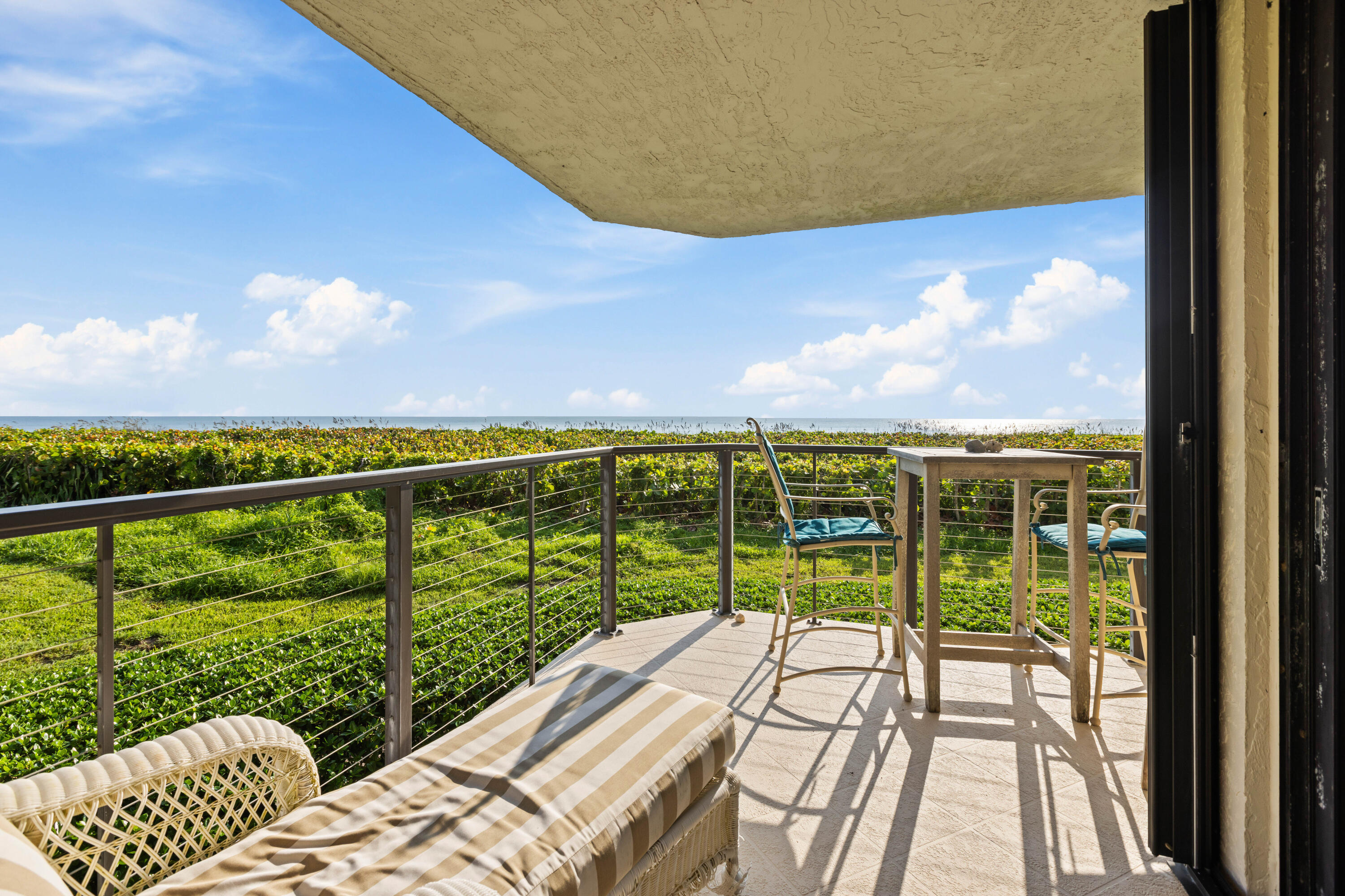 a view of a balcony with lake view