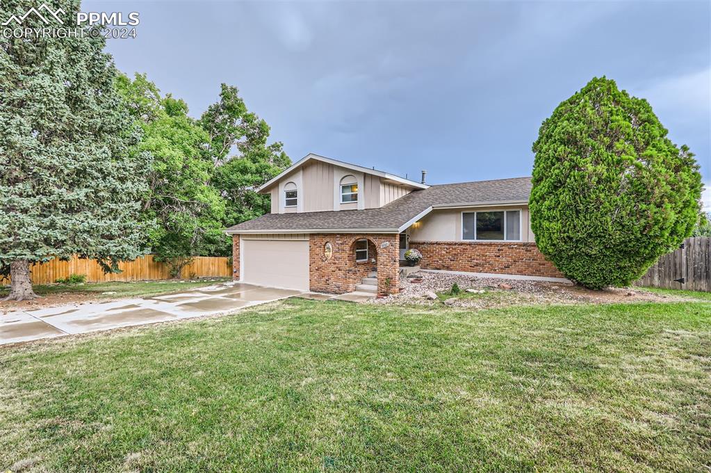 front view of a house with a yard