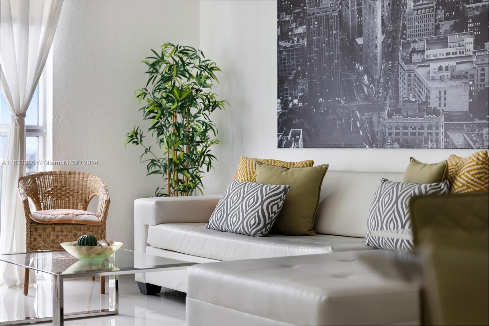 a bedroom with a bed and a potted plant