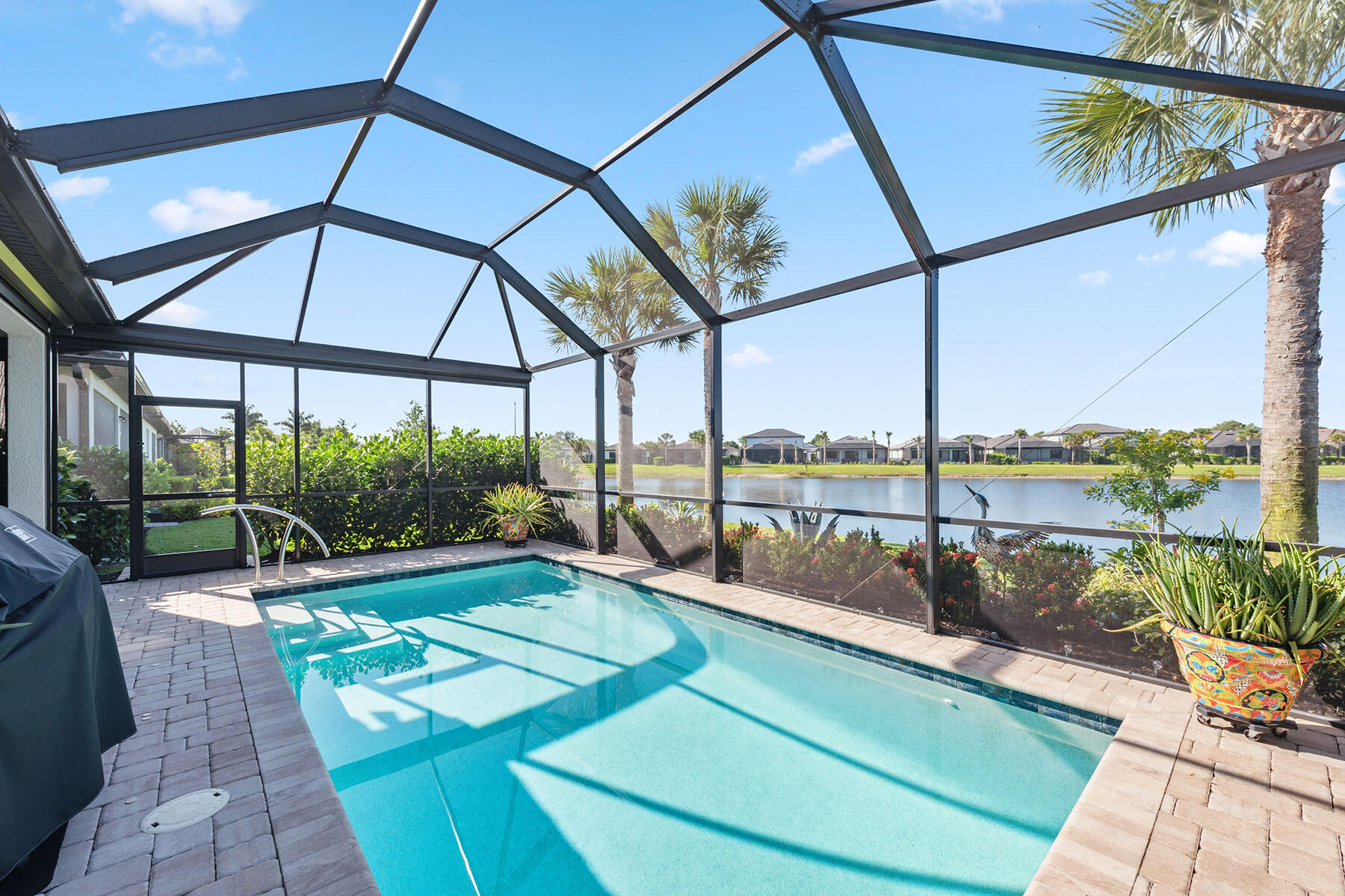 a view of swimming pool with a patio