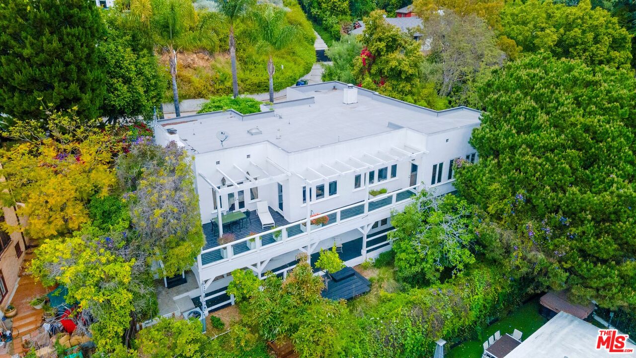 an aerial view of a house with balcony