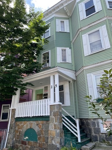 a front view of a house with a balcony