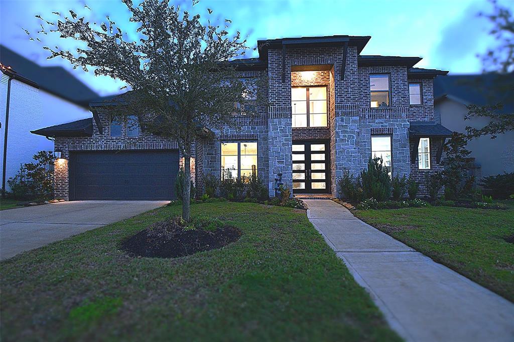 a house view with a garden space