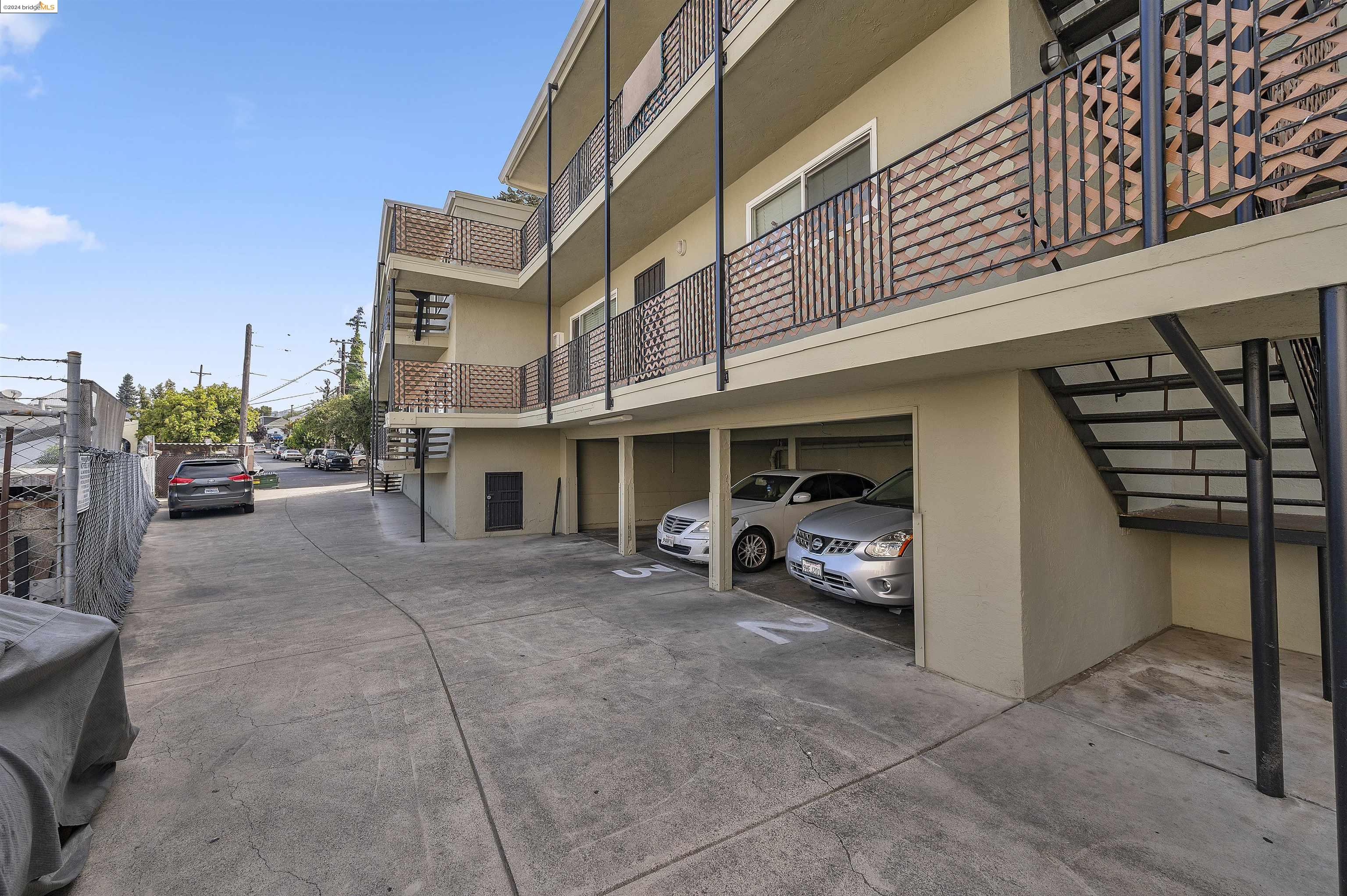 a view of a car park in front of building