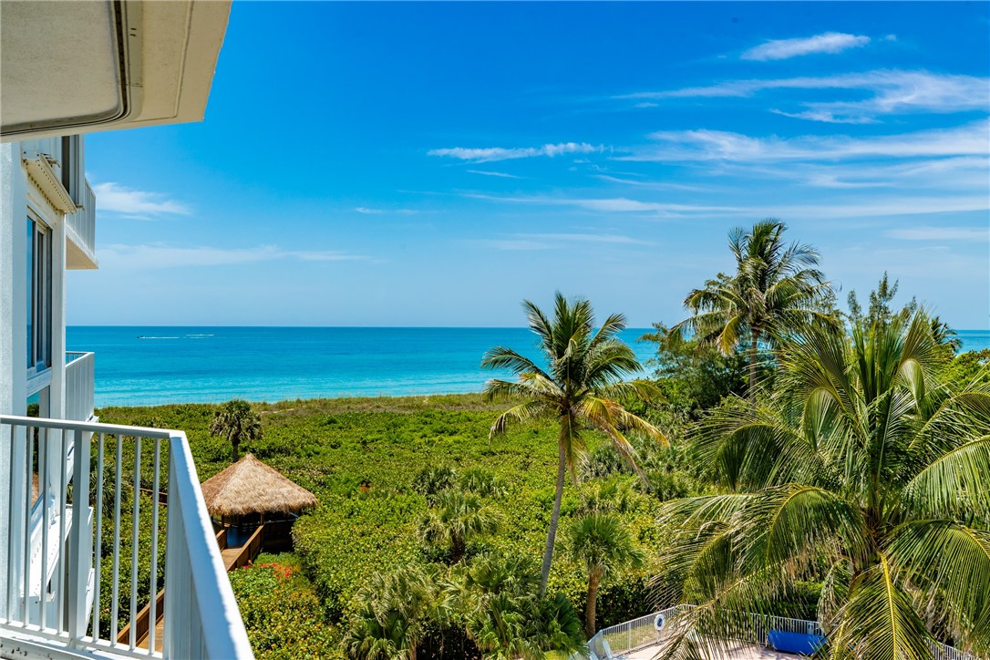 a view of a yard with an ocean view