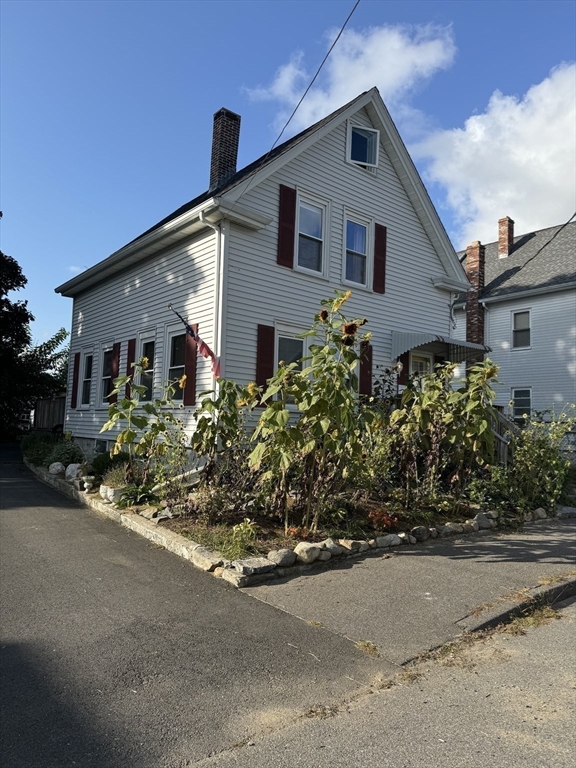 front view of a house with a street