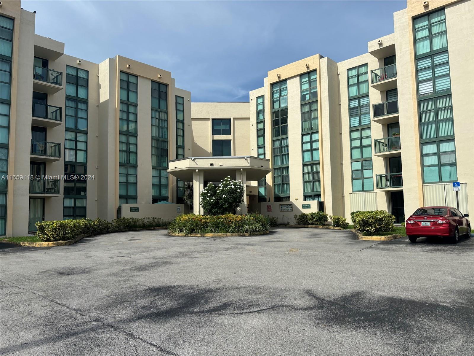 a front view of a building with glass windows