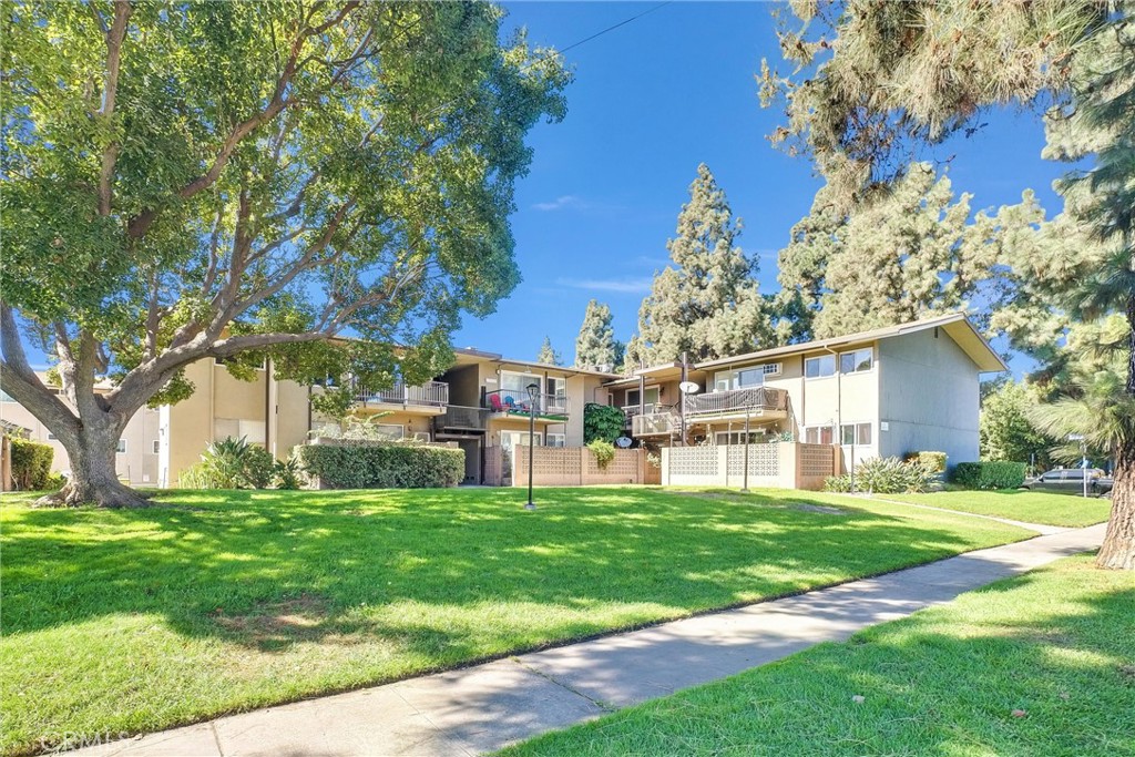 a view of a house with a back yard