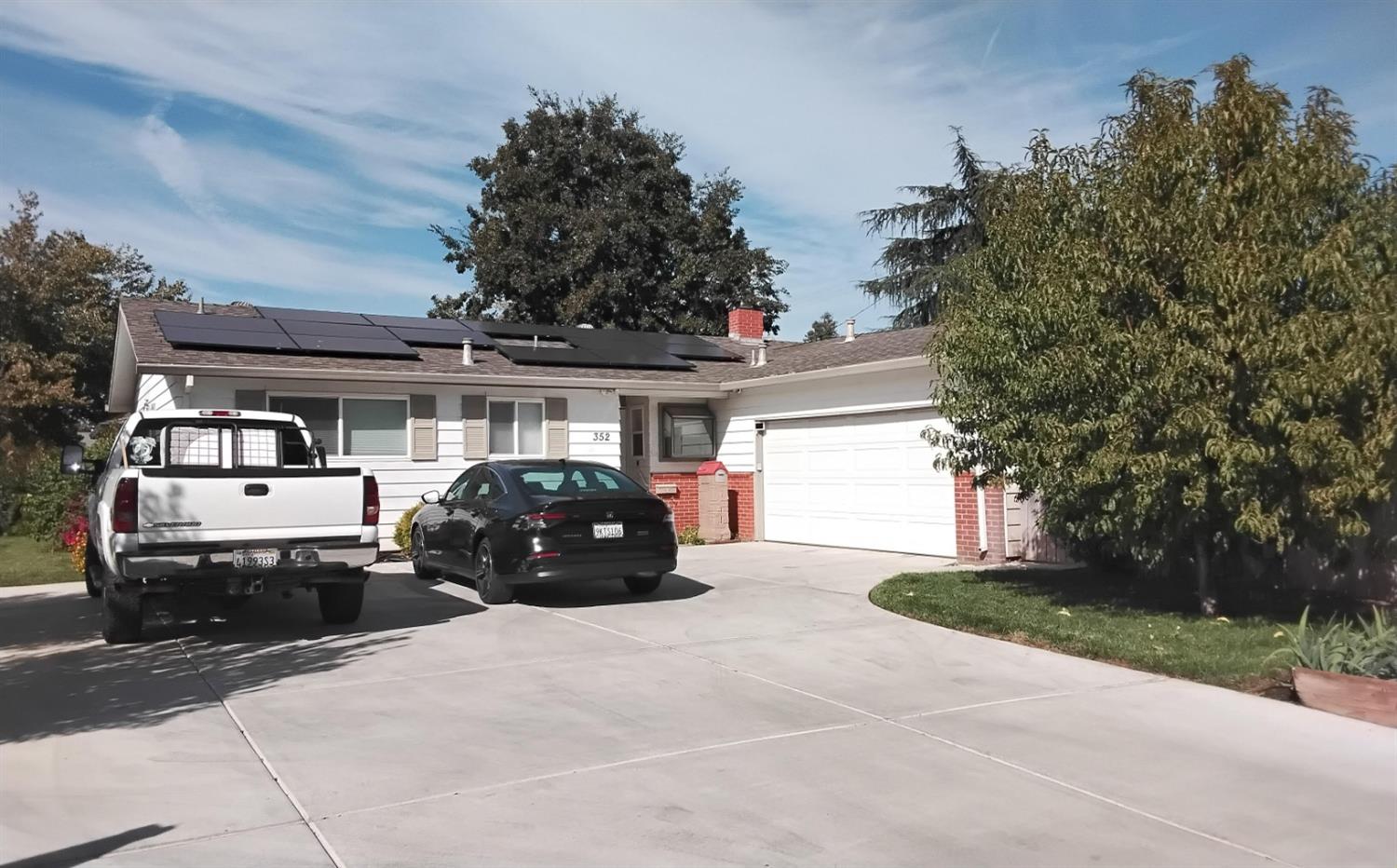 a car parked in front of a house