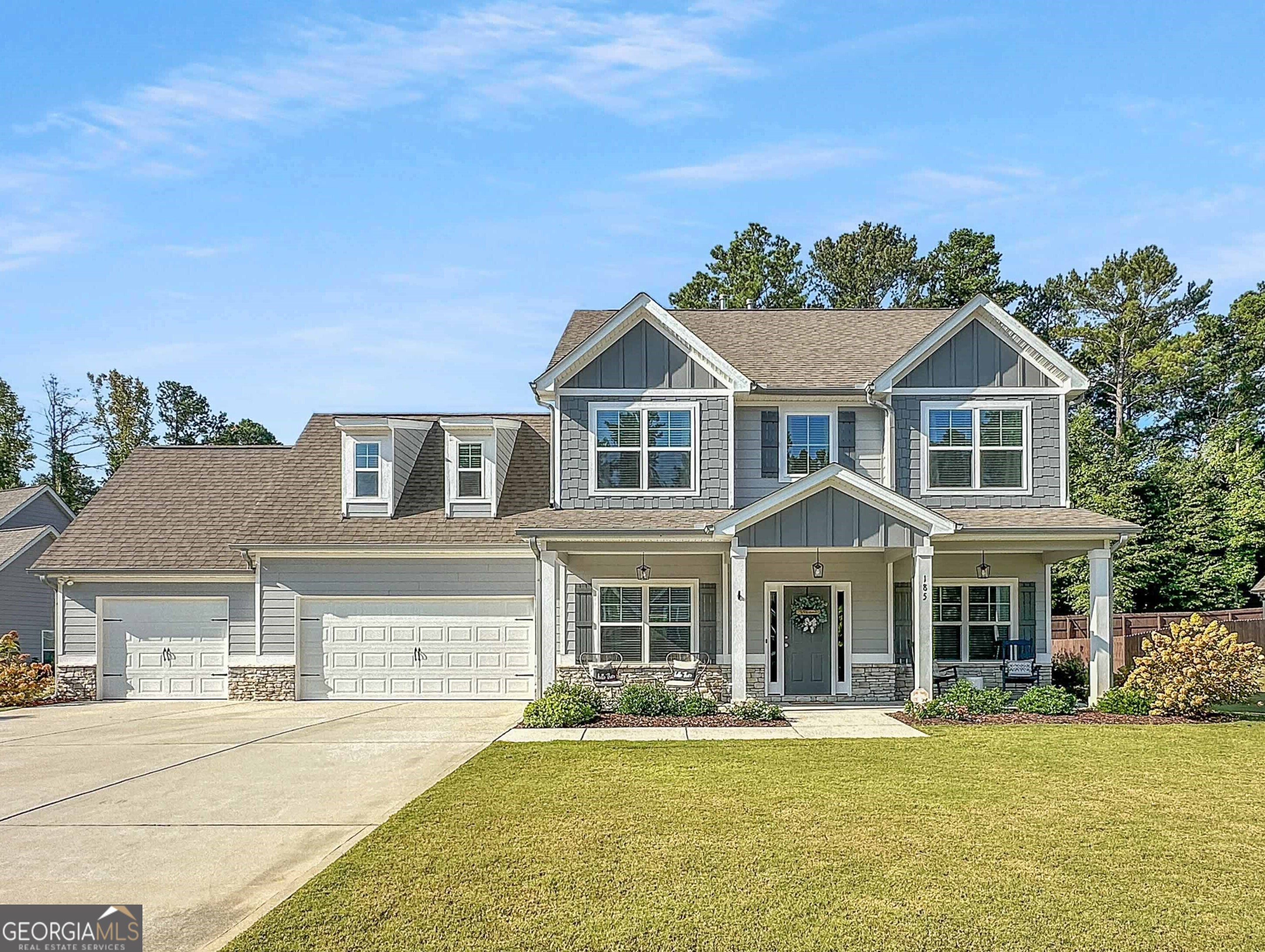 front view of a house with a yard