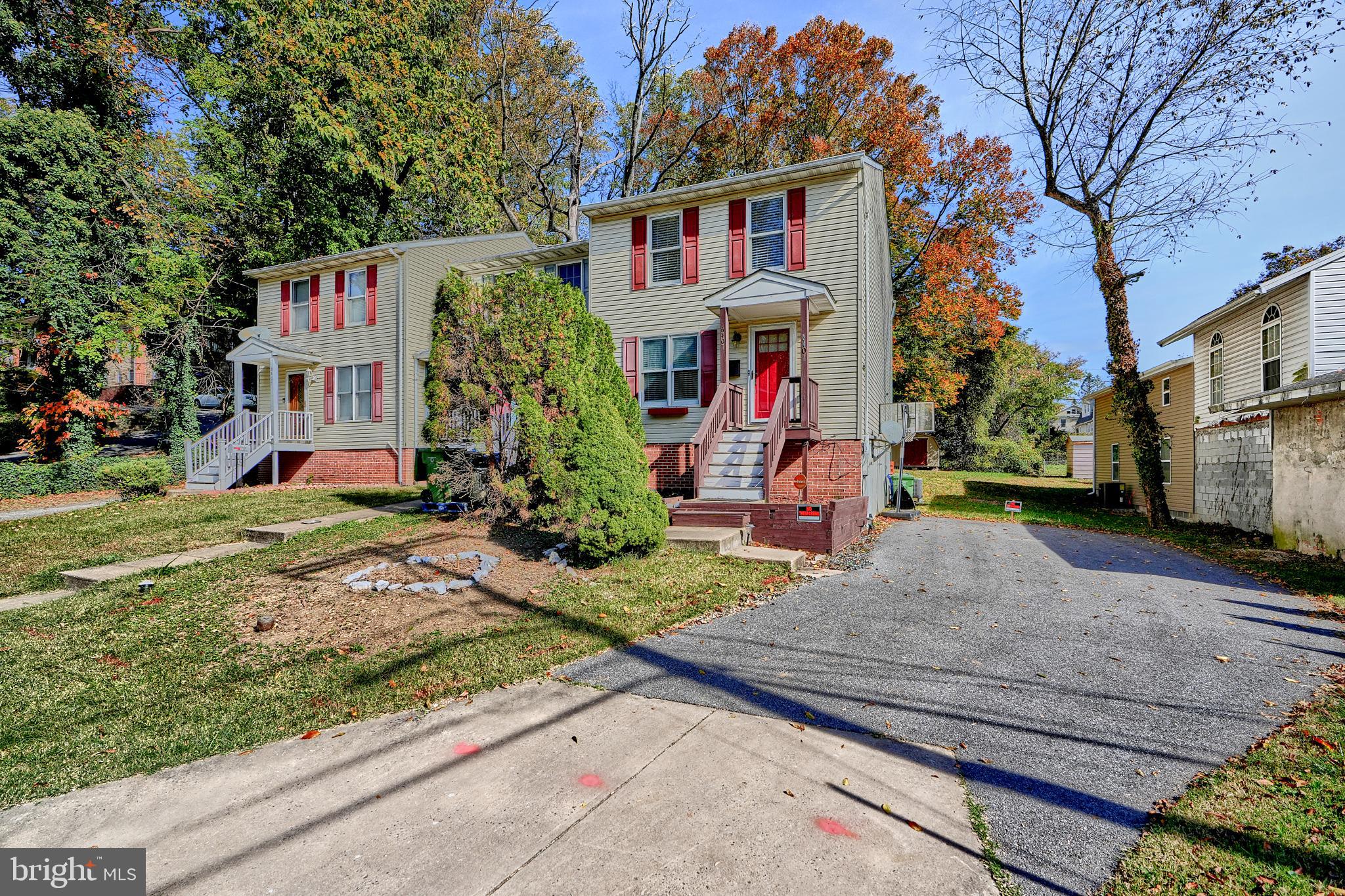 a front view of house with yard