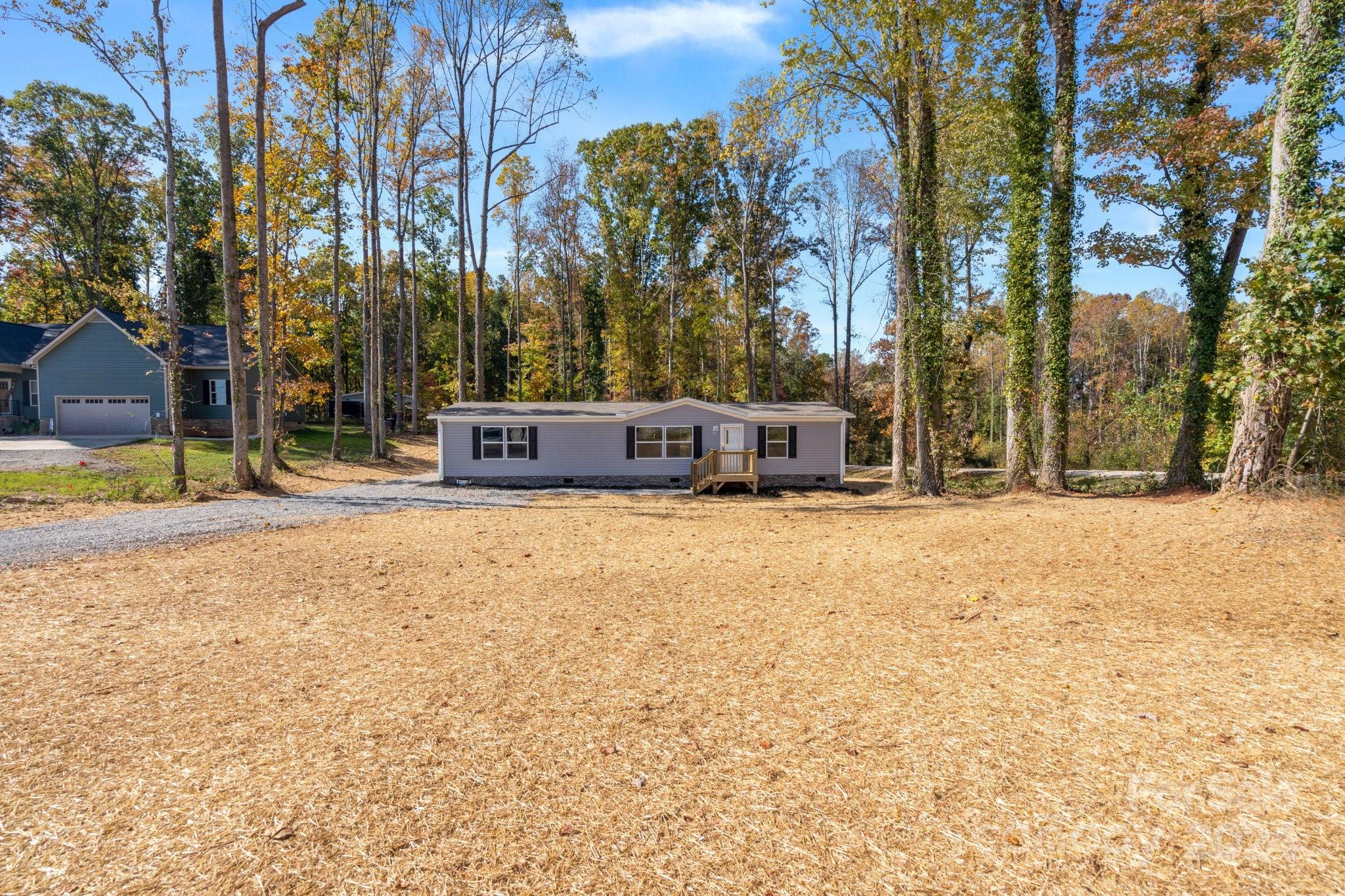 a house with trees in front of it