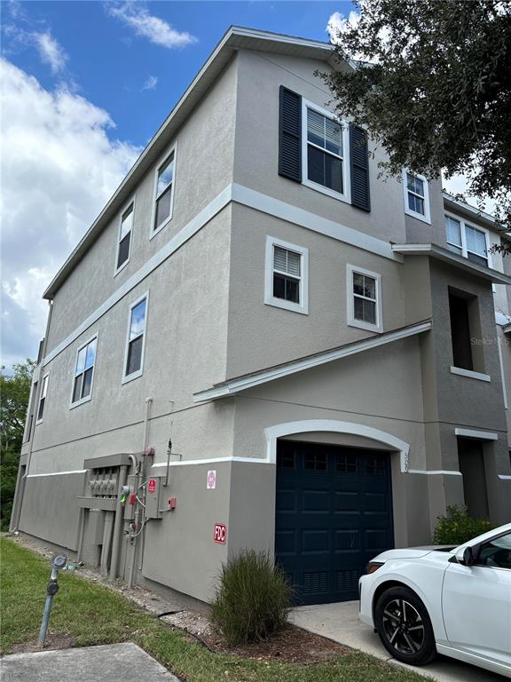 a front view of a house with a garage