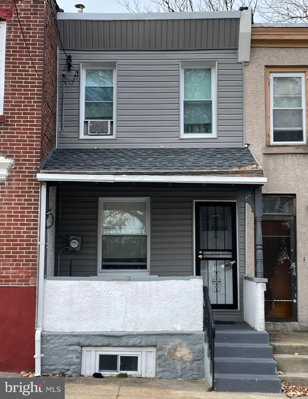 a front view of a house with an entrance