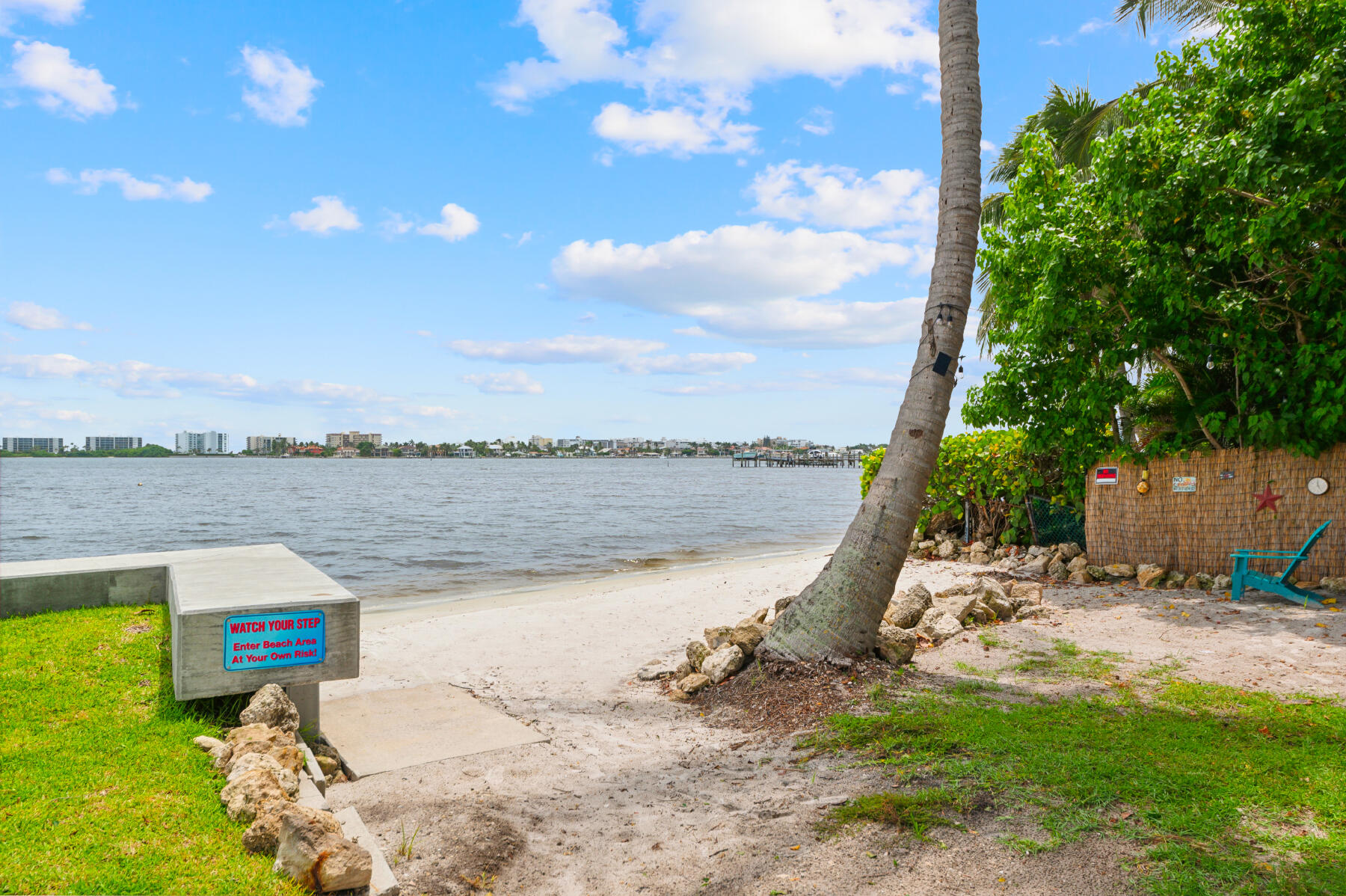 a view of a lake with a yard