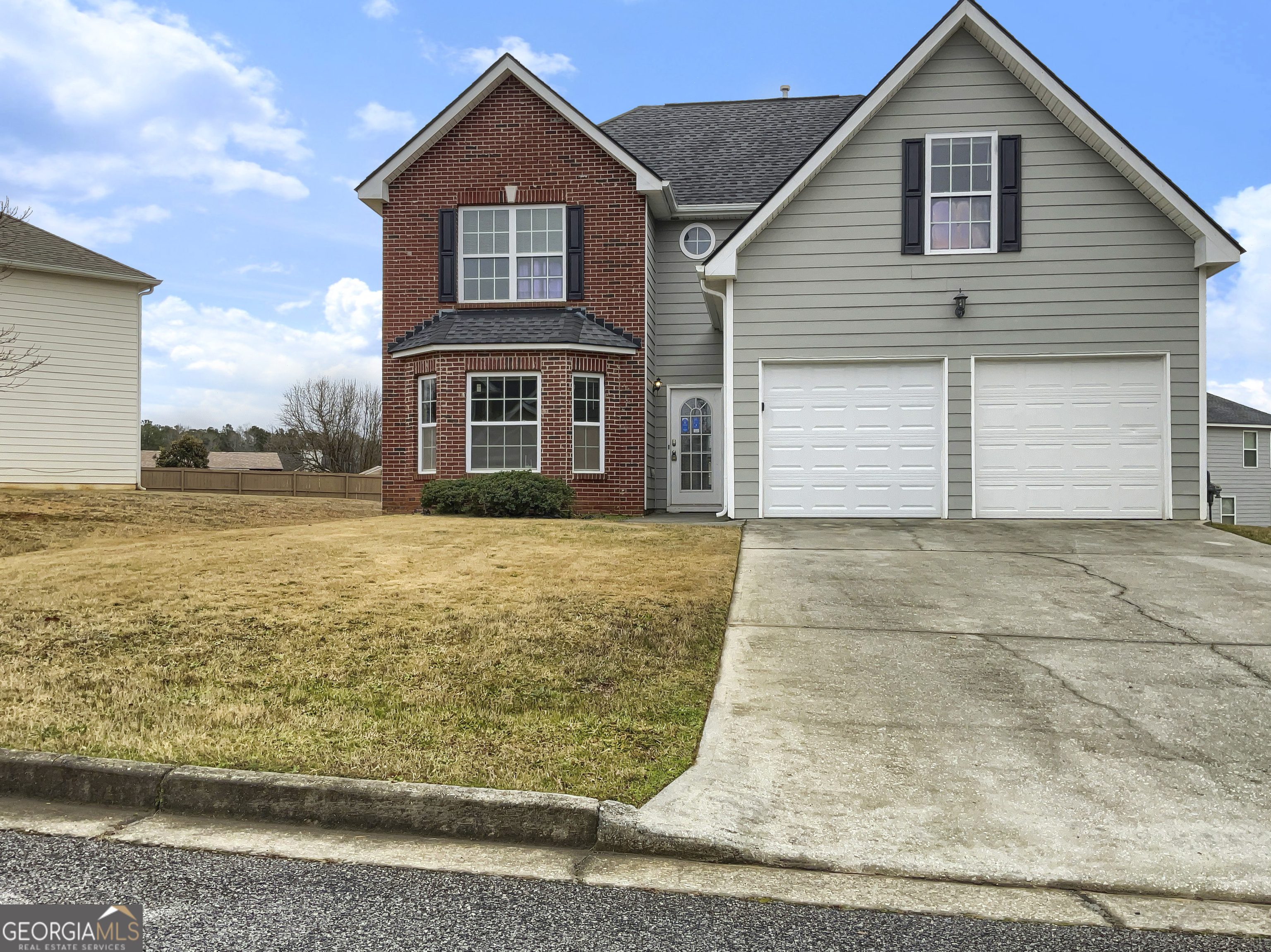 a front view of house with yard