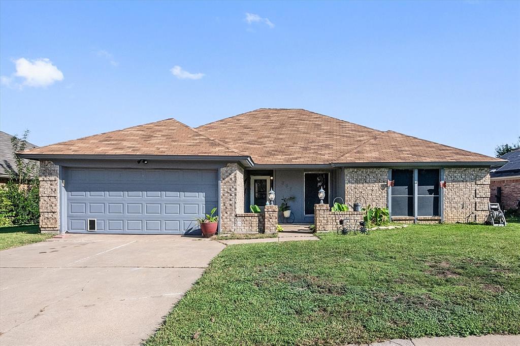 a front view of a house with patio