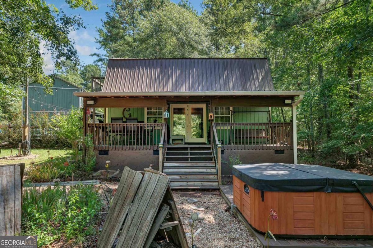 a backyard of a house with seating space