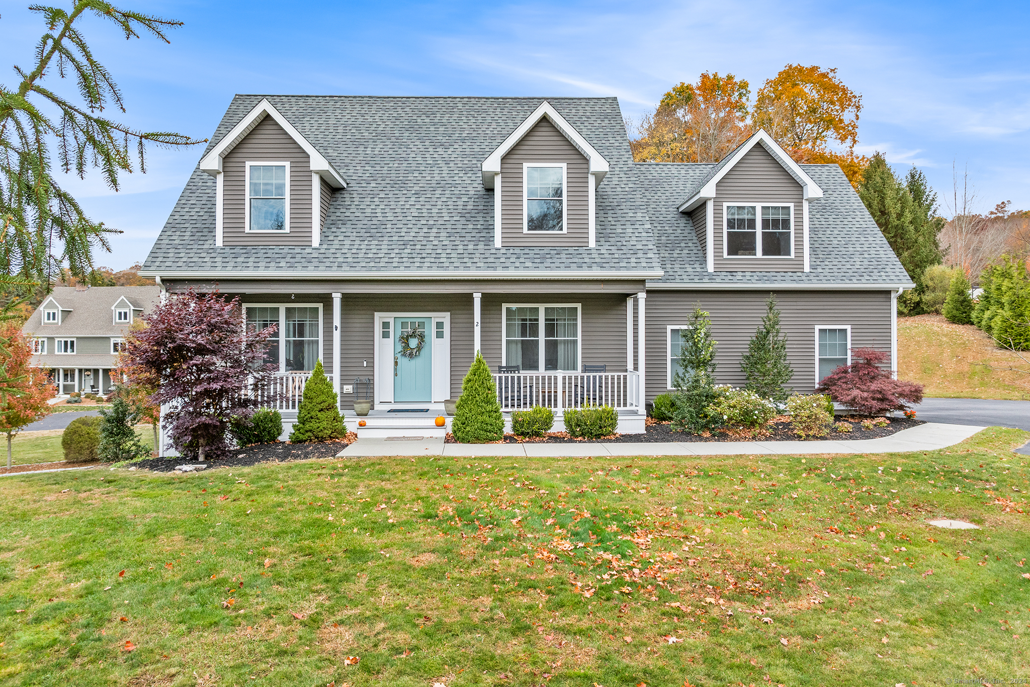 front view of a house with a yard