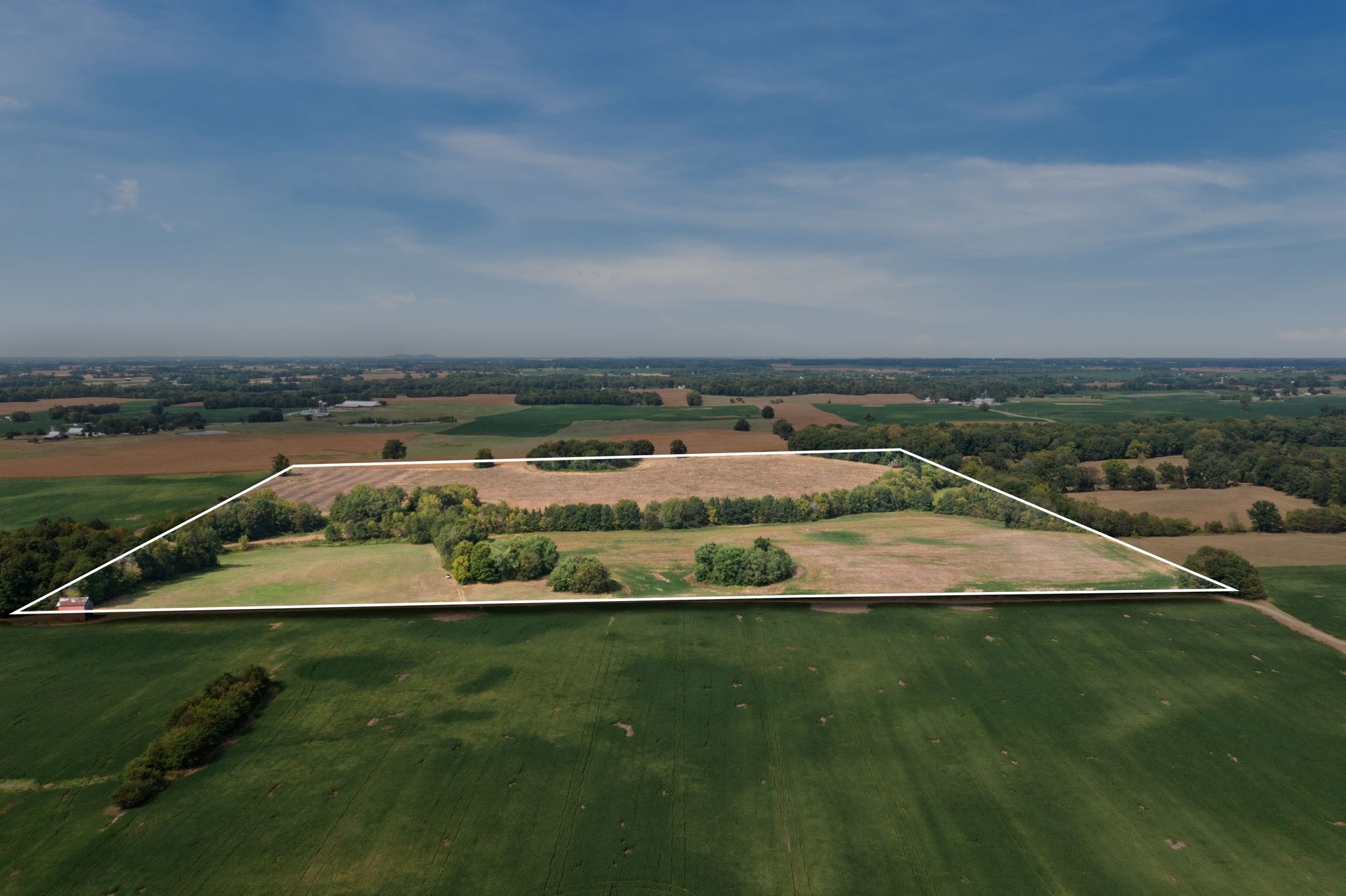 a view of a lake with a big yard