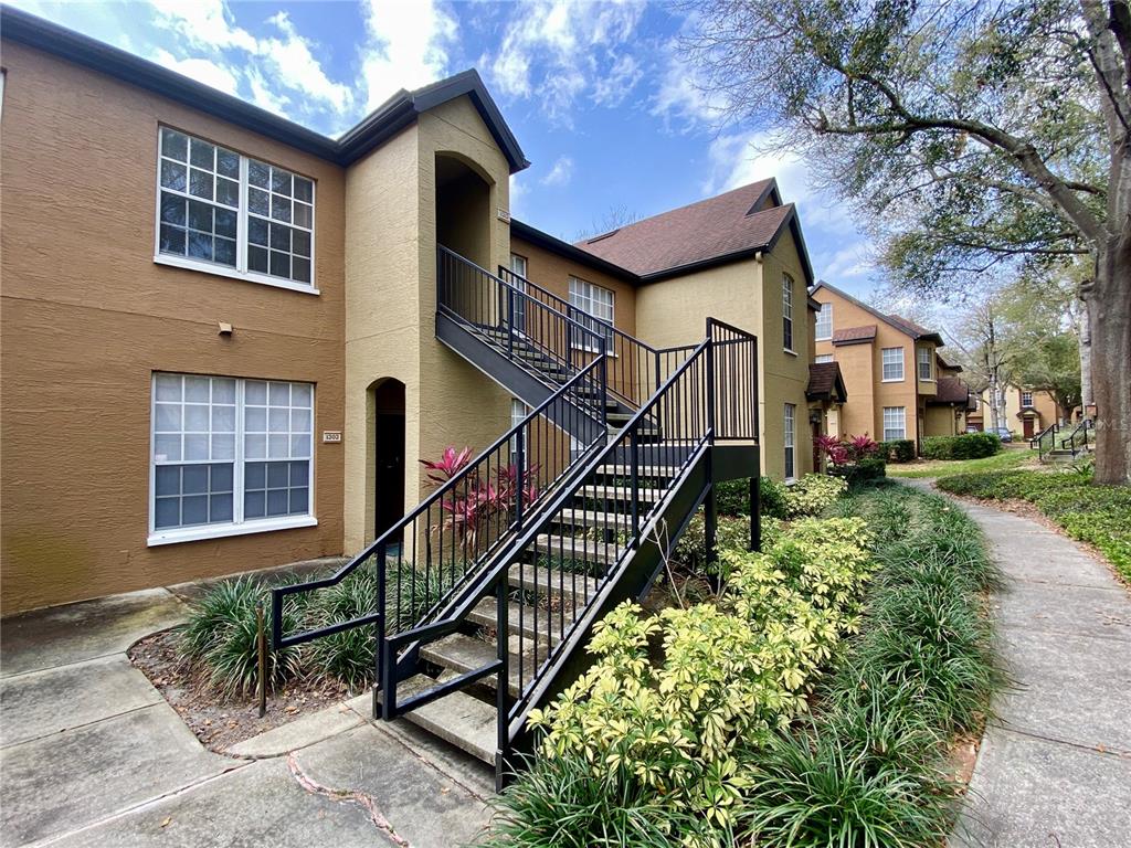 front view of a house with a small yard