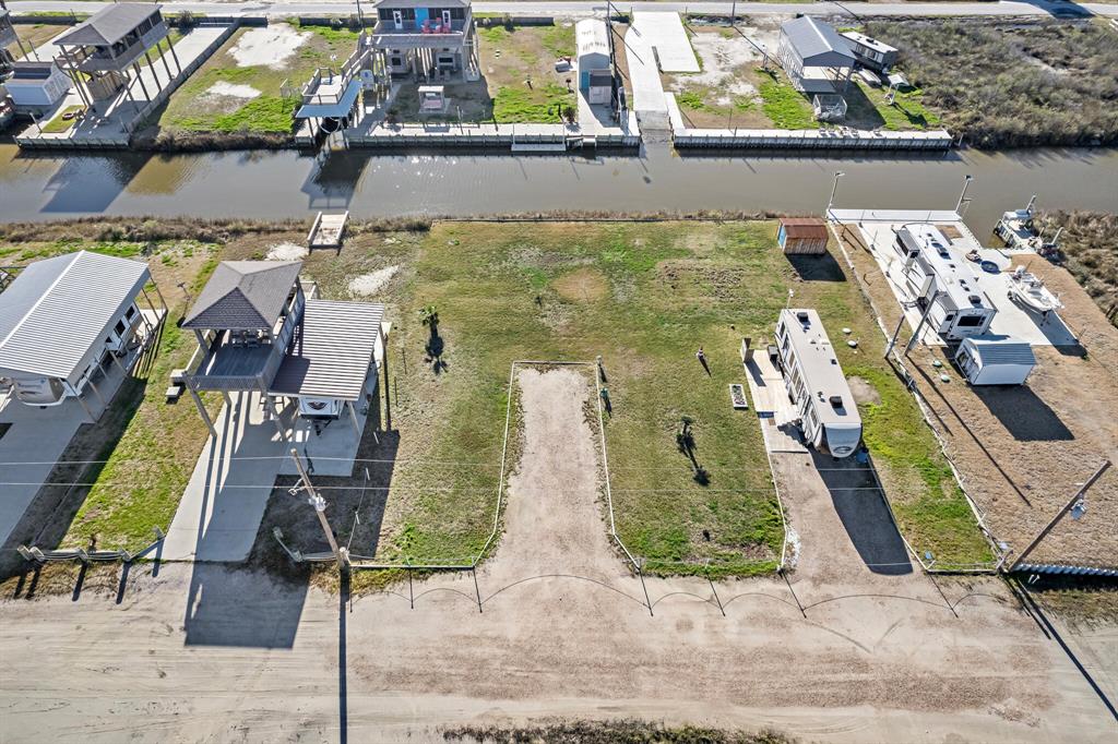 an aerial view of houses with outdoor space