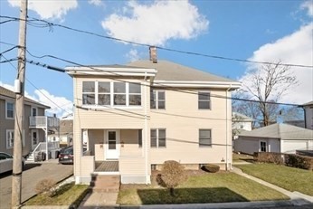 a front view of a building with street view