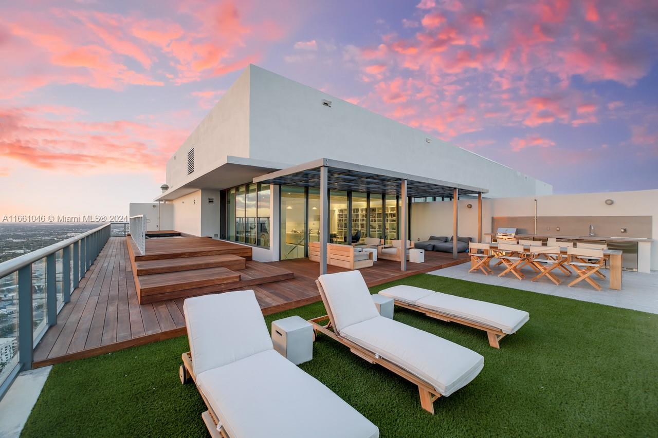 a view of pool with outdoor seating