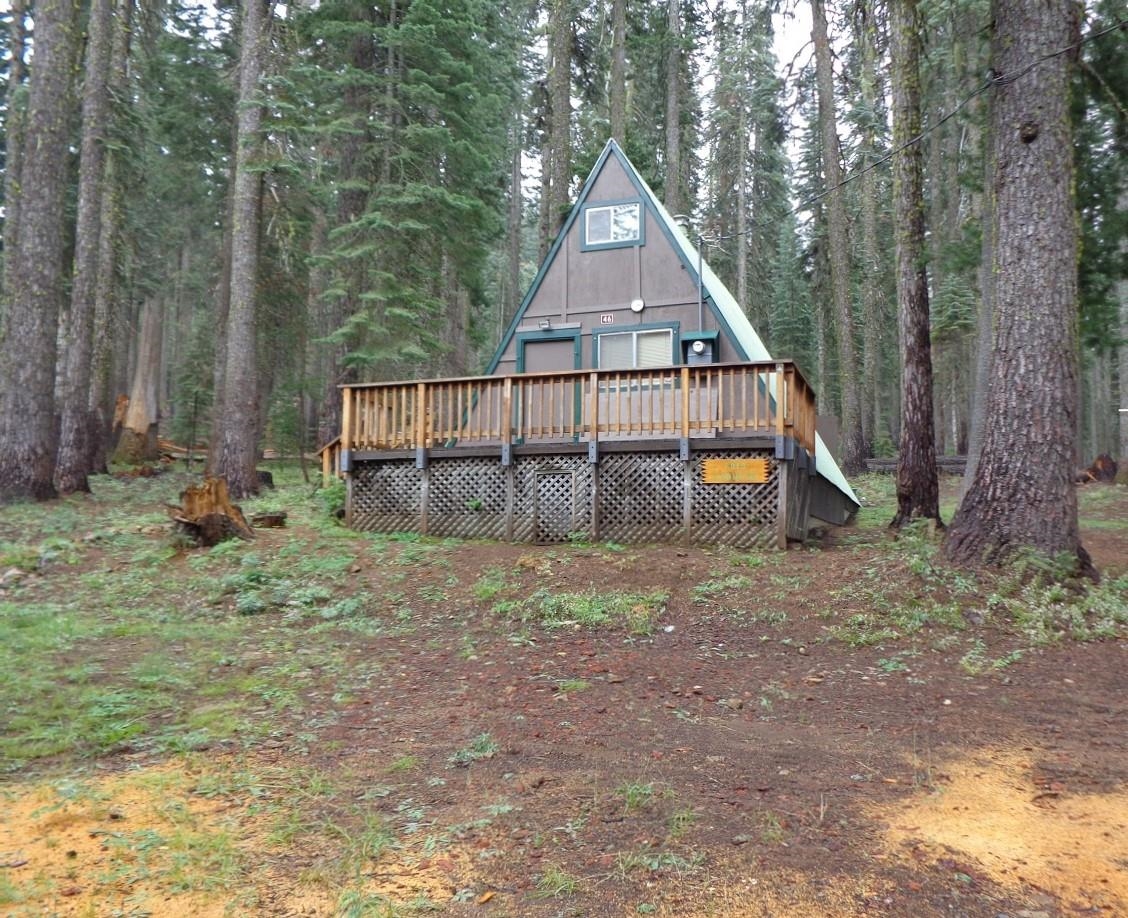 a view of house with outdoor space