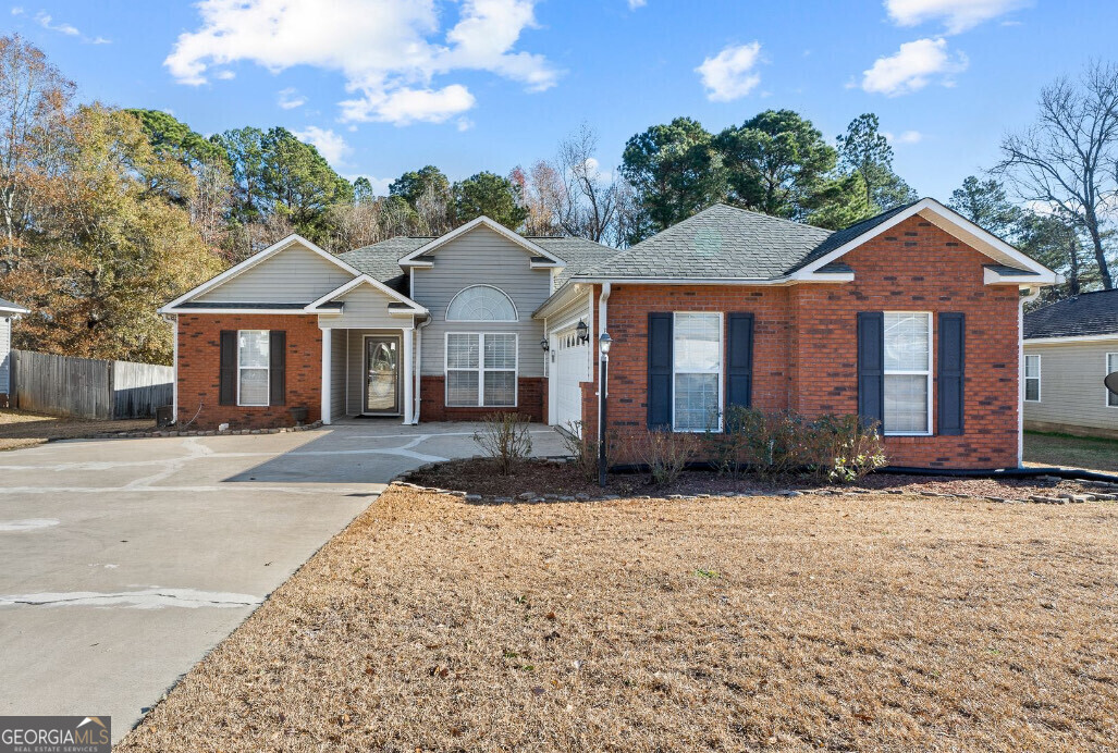 front view of a house with a yard